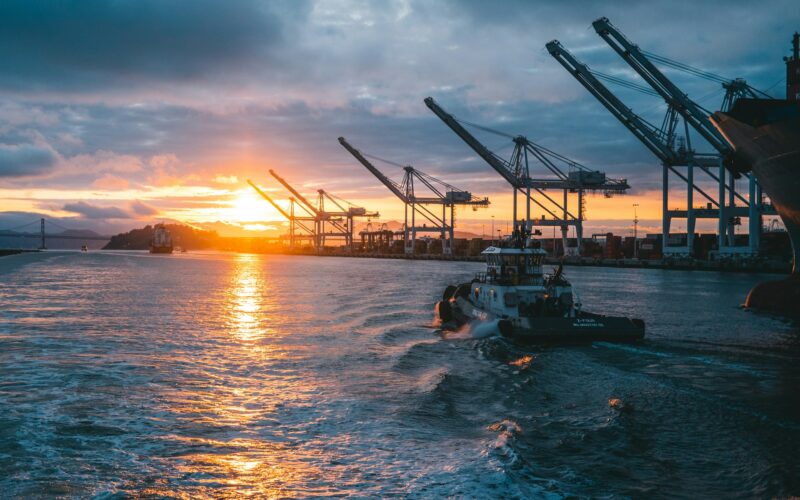 a boat moves through water along a port