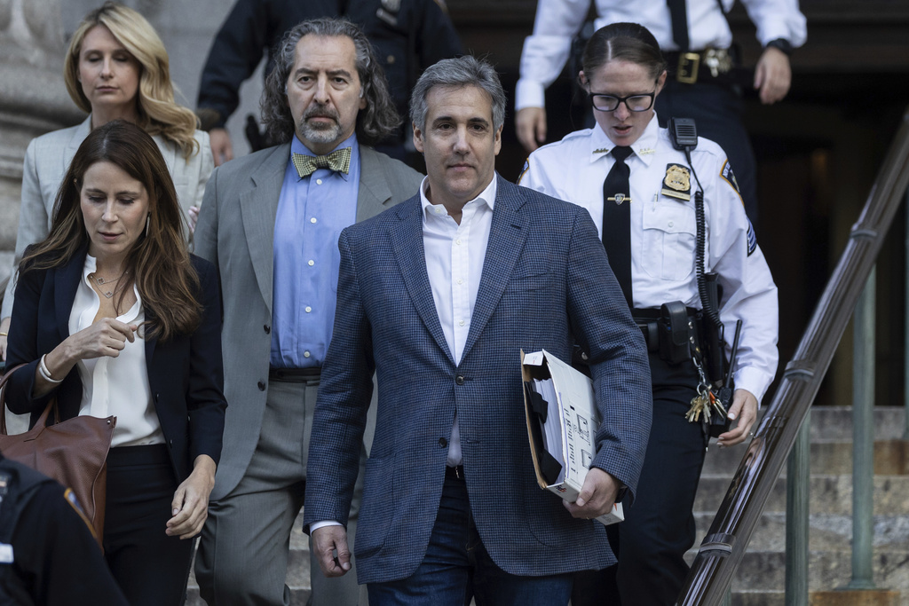 Michael Cohen leaves former President Donald Trump's civil business fraud trial at New York Supreme Court, Tuesday, Oct. 24, 2023, in New York. (AP Photo/Yuki Iwamura)