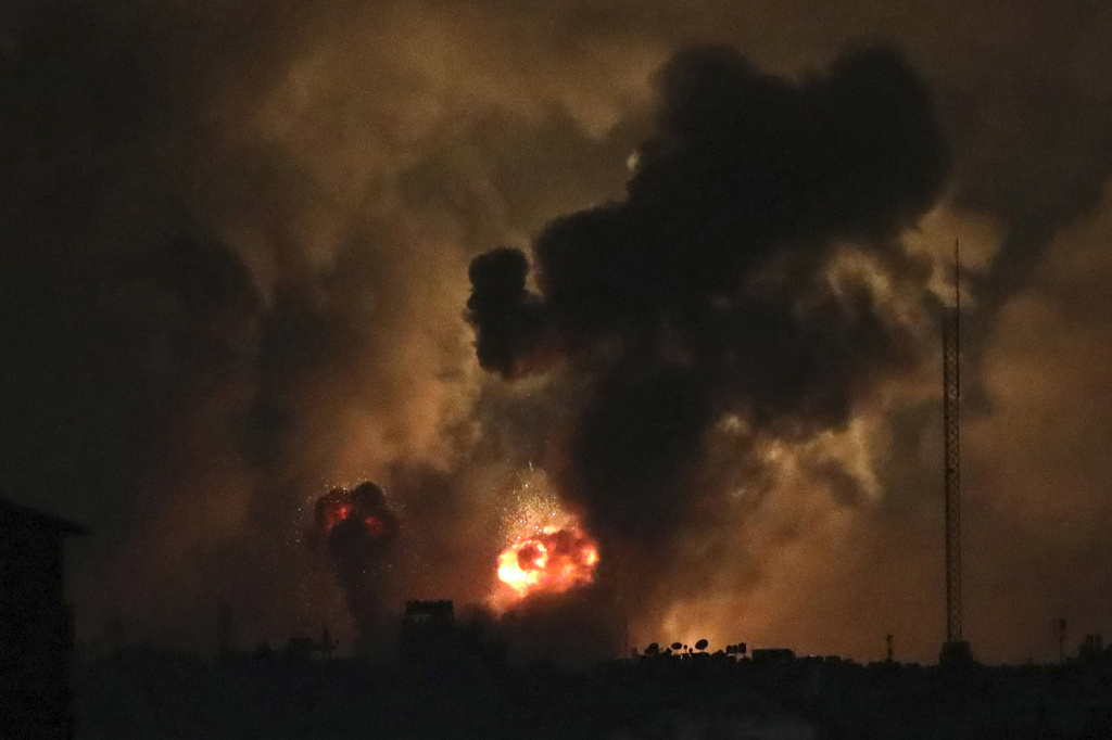 Smoke rises from explosions caused by Israeli airstrikes in the northern Gaza Strip, Friday, Oct. 27, 2023. (AP Photo/Abed Khaled)