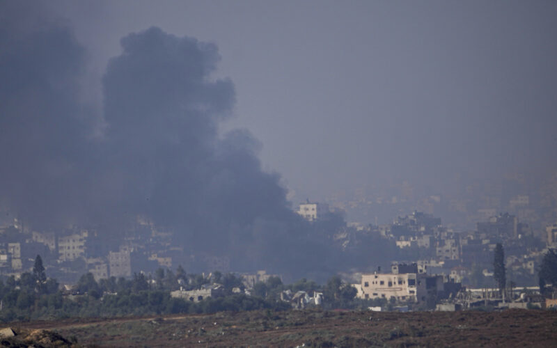 Smoke rises following an Israeli airstrike in the Gaza Strip, as seen from southern Israel, Friday, Dec. 1, 2023. (AP Photo/Ariel Schalit)