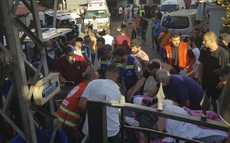 Civil Defense first-responders carry a man who was wounded after his handheld pager exploded, in the southern port city of Sidon, Lebanon, Tuesday, Sept. 17, 2024.(AP Photo)