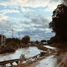 a photo of post-Helene damaged road along a river in Southern Appalachia